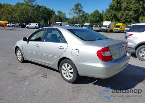 2004 Toyota Camry Xle z USA, uszkodzony, nr VIN 4T1BE30K54U928149